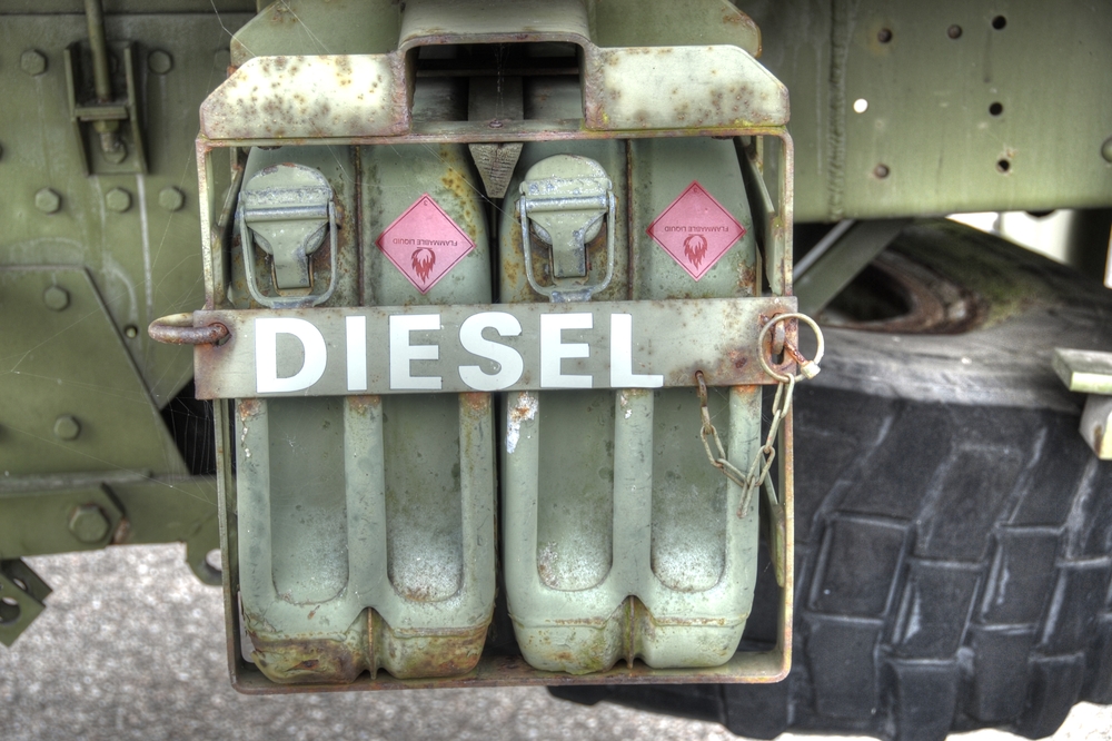 Two old labels on old diesel canisters